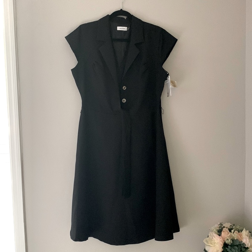 NEW WITH TAGS Calvin Klein black fit and flare dress, broken zipper.